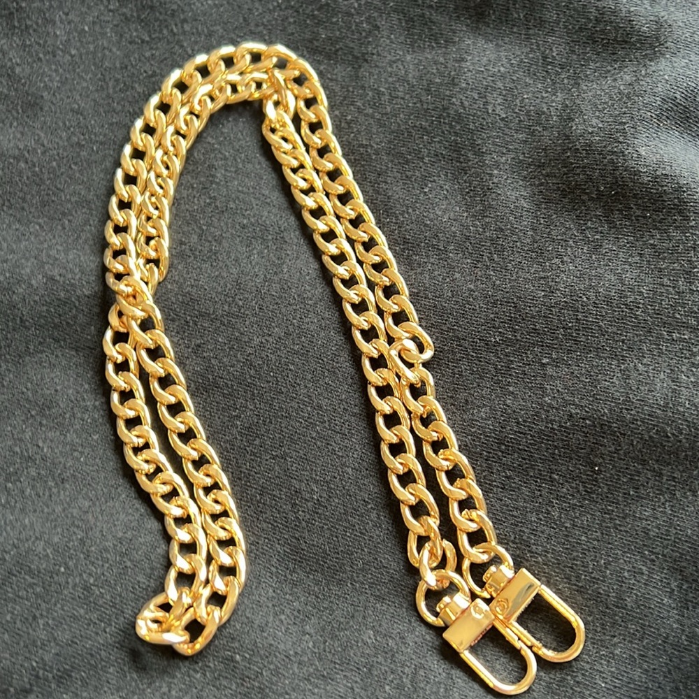Gold tone bag strap